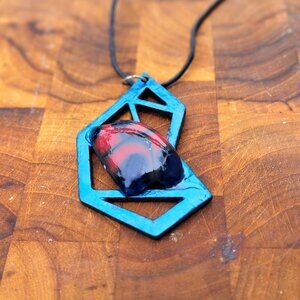 Bohemian necklace with a Zen figure made of wood and fused glass